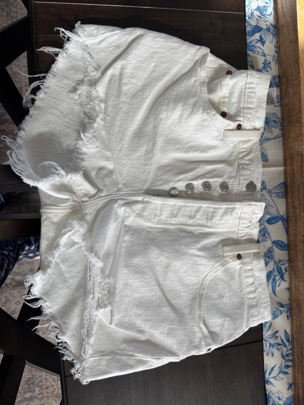 Levi’s distressed white shorts
